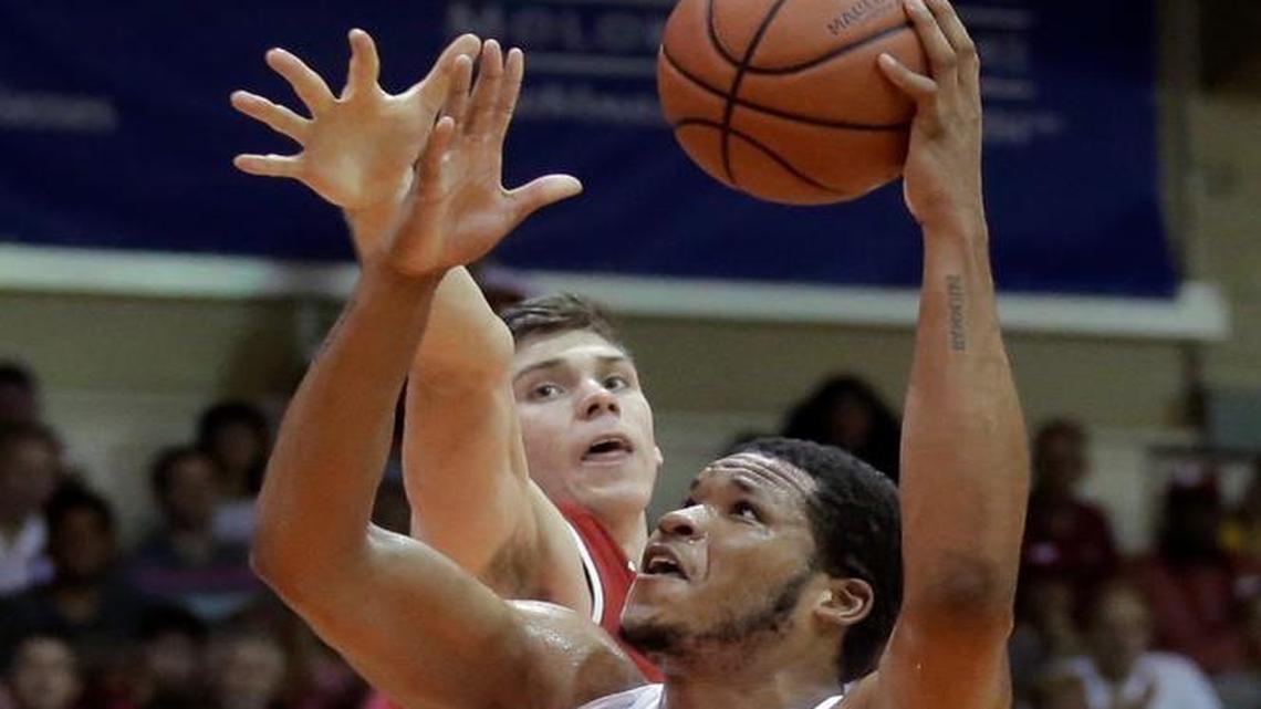 North Carolina forward Kennedy Meeks (3) goes to the basket as Wisconsin forward Ethan Happ, rear, defends during the first half during an NCAA college basketball game in the Maui Invitational on Wednesday, Nov. 23, 2016, in Lahaina, Hawaii.