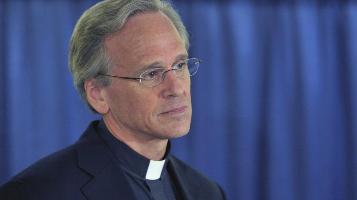 In this April 15, 2014, file photo, Notre Dame University President John Jenkins speaks in South Bend, Ind. The NCAA has denied Notre Dame's appeal of a decision to vacate 21 victories because of academic misconduct. In a letter to Notre Dame alumni, Jenkins criticized the decision. He called the ruling unfair, referencing the recent North Carolina case in which the NCAA did not punish the school after an investigation of athletes taking irregular courses. (AP Photo/Joe Raymond, File)