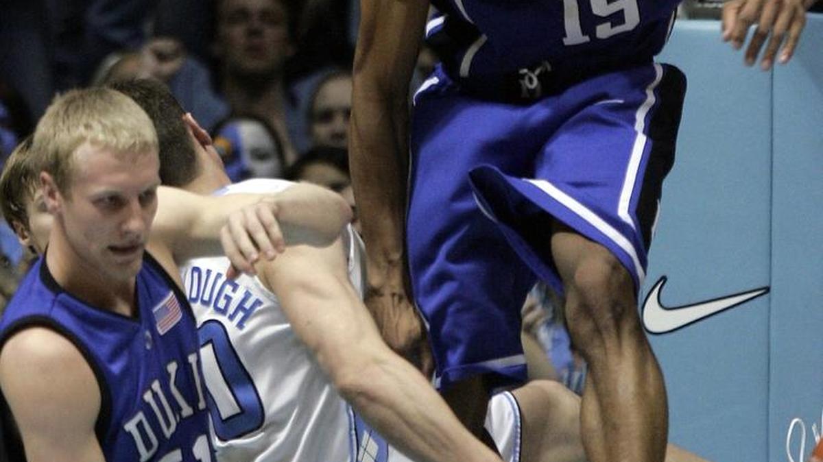 Duke’s Gerald Henderson, right, was ejected from the game after this flagrant foul on UNC’s Tyler Hansbrough middle, near Duke’s Steve Johnson, left, on March 4, 2007. Henderson was ejected from the game.
