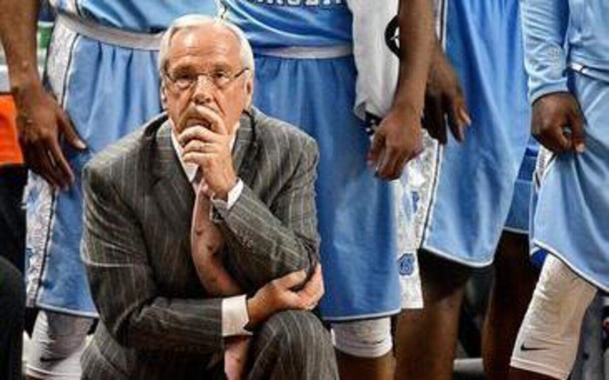 
North Carolina head coach Roy Williams and the bench watch in the closing minute of the game as the Tar Heels maintain their lead and defeat Louisville 70-60 during ACC tournament quarterfinal action March 12 at the Greensboro Coliseum.
