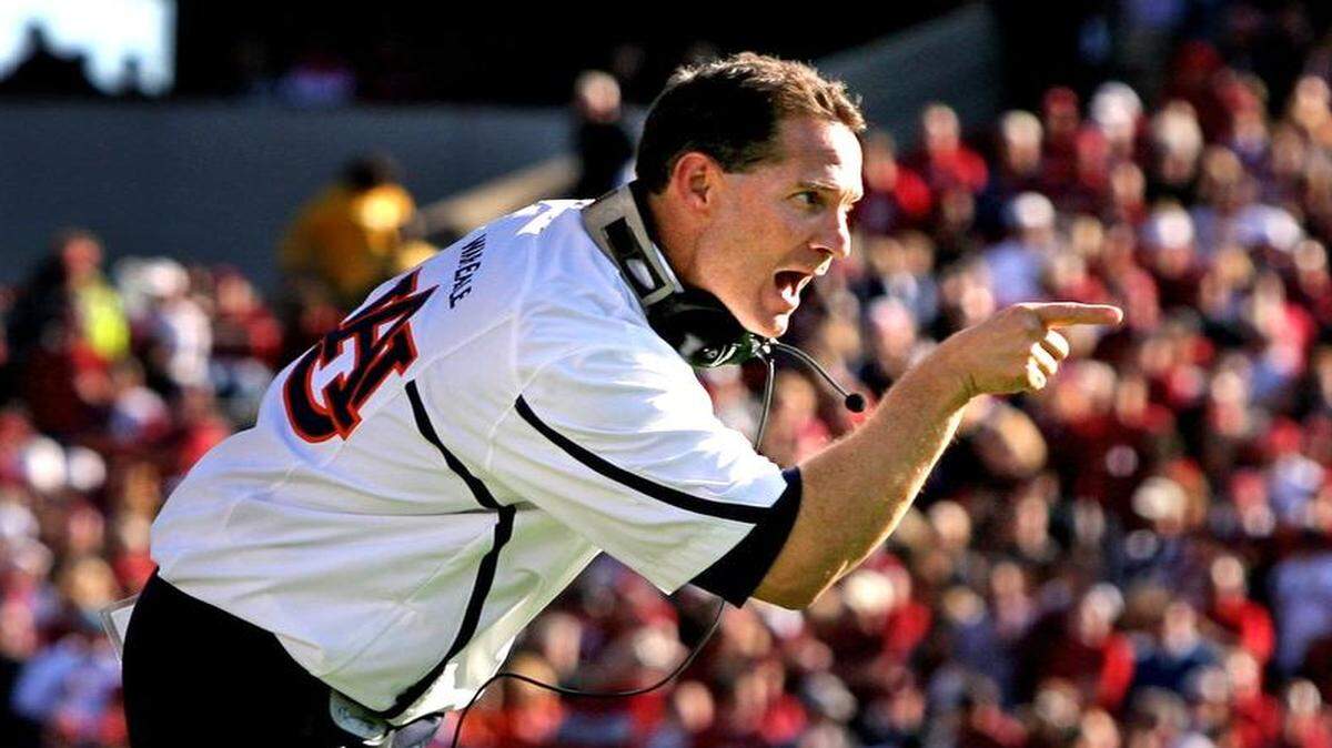 
Auburn head coach Gene Chizik celebrates after his team's touchdown in the second quarter of the Gamecocks game against Auburn at Williams-Brice Stadium, Saturday, October, 1, 2011.
