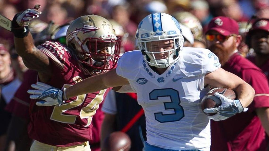North Carolina’s Ryan Switzer (3) looks for running room ahead of Florida States Marcus Lewis (24) after a pass reception from Mitch Trubisky Saturday at Doak Campbell Stadium in Tallahassee, Florida.