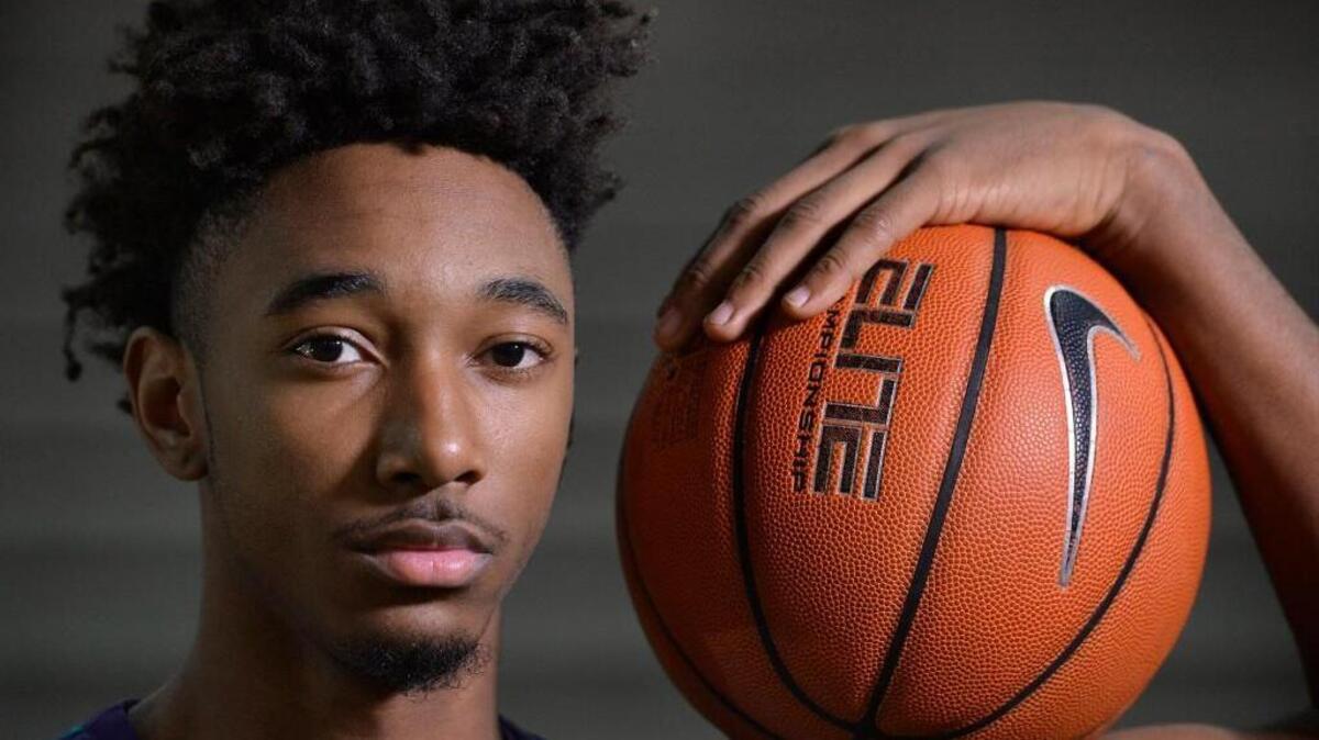 Cox Mill High basketball player Rechon Black signed with UNC on Wednesday.