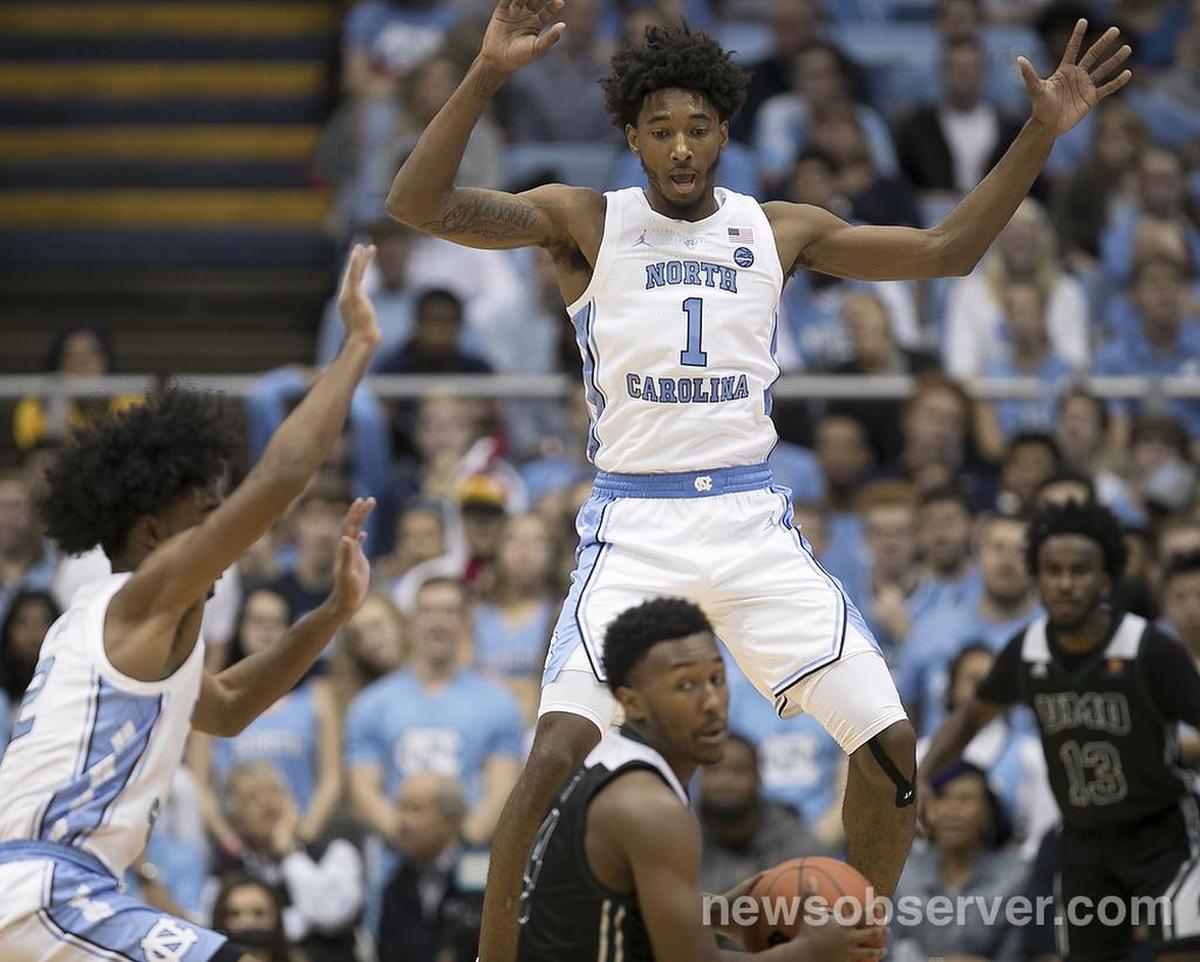North Carolina’s Coby White (2) and Leaky Black (1) trap Mt. Olive’s Alan Treakle (4) during the first half of the Tar Heels’ exhibition game on Friday, November 2, 2018 at the Smith Center in Chapel Hill, N.C.