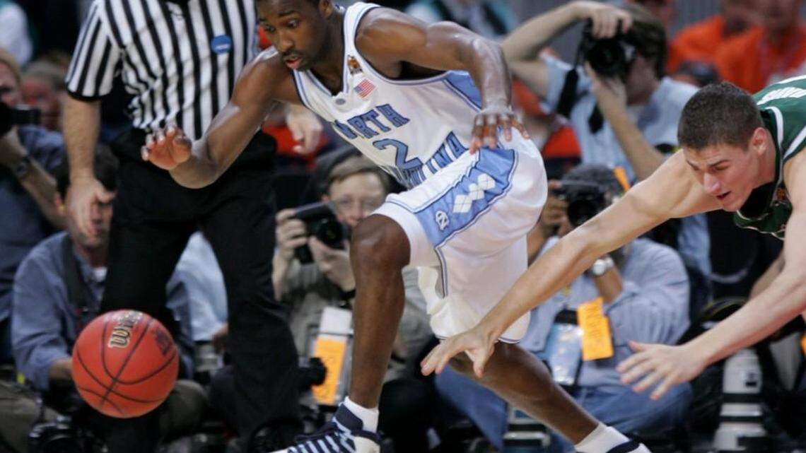 UNC’s Raymond Felton tries to steal the ball from Michigan State’s Paul Davis in the Final Four on April 1, 2005. The Tar Heels beat the Spartans, 87-71, then went on to beat Illinois 75-70 in the national title game.