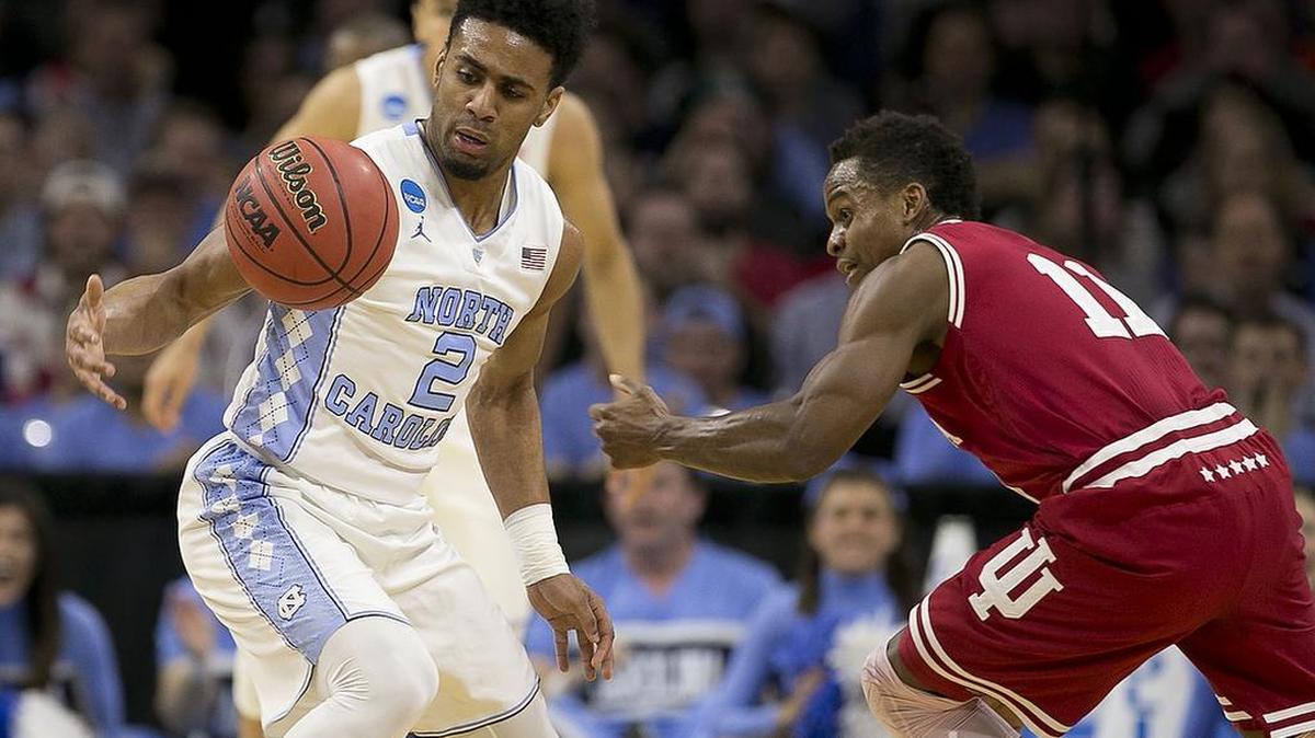 North Carolina’s Joel Berry II (2) makes a steal from Indiana’s Yogi Ferrell (11) during the first half.