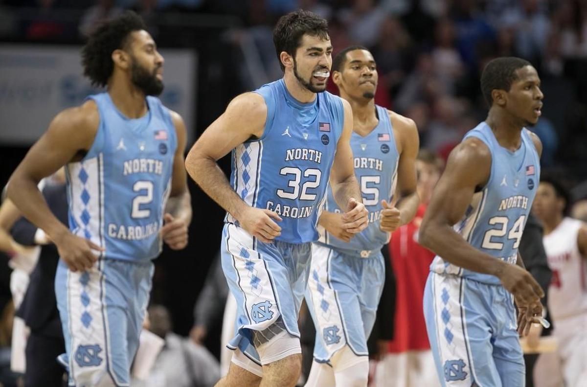 North Carolina’s Luke Maye (32) and Joel Berry II (2) come out of the game in the final minute of play against Davidson on Friday, December 1, 2017 at the Spectrum Center in Charlotte, N.C. Maye scored 24 points, and Berry scored 27 in the Tar Heels’ 85-75 victory.