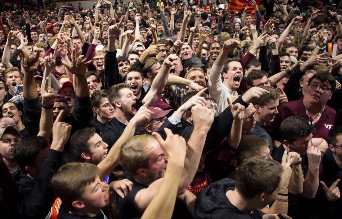 Virginia Tech fans storm the court to celebrate their 80-69 victory over North Carolina on Monday, January 22, 2018 at Cassell Coliseum in Blacksburg, Virginia.
