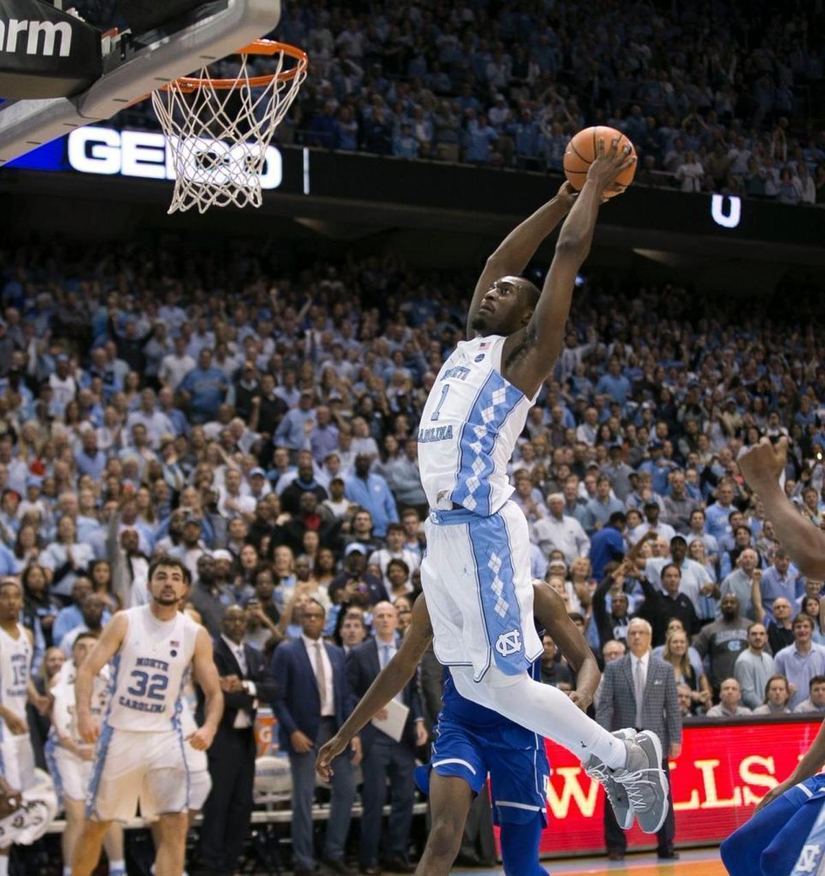 North Carolina's Theo Pinson (1) dunks to seal the Tar Heels' 82-78 victory over Duke on Thursday, February 8, 2018 at the Smith Center in Chapel Hill, N.C.