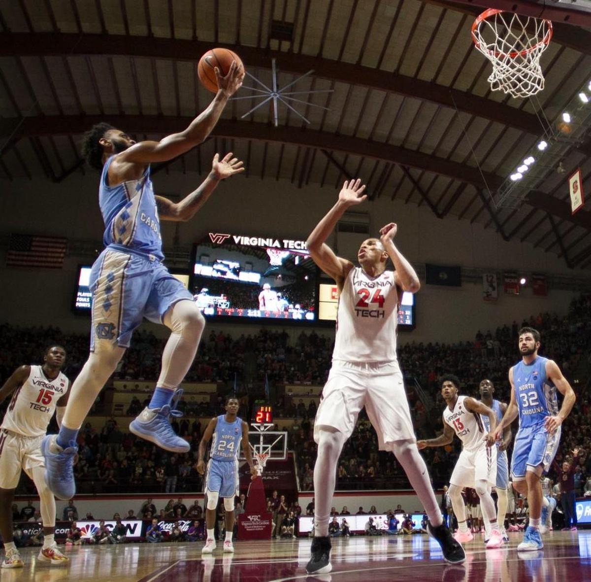 North Carolina’s Joel Berry II (2) drives against Virginia Tech’s Kerry Blackshear Jr. (24) during the second half on Monday, January 22, 2018 at Cassell Coliseum in Blacksburg, Virginia.