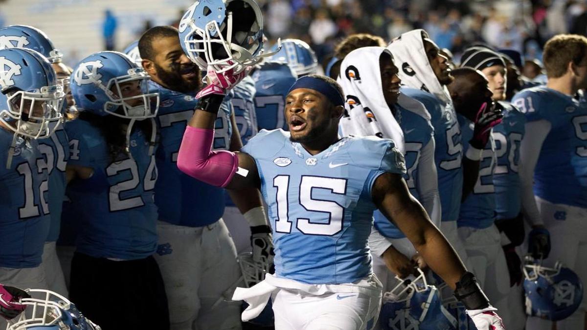 North Carolina‚Äôs Donnie Miles (15) and his teammates celebrate their 50-14 victory over Wake Forest on Saturday, October 17, 2015 at Kenan Stadium in Chapel Hill, N.C.