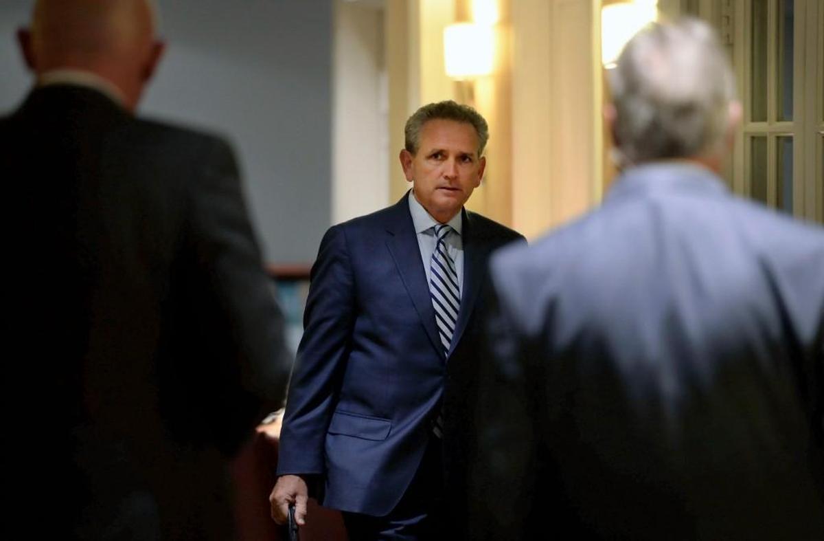 University of North Carolina athletic director Bubba Cunningham arrives at an NCAA hearing Wednesday, Aug. 16, 2017, in Nashville, Tenn. It has taken more than two years for North Carolina to appear before an NCAA infractions committee panel since initially being charged with five top-level violations amid its long-running academic scandal.