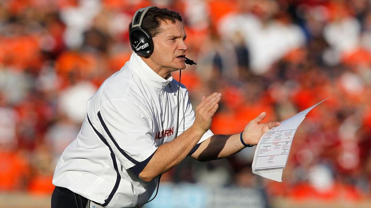 
Auburn head coach Gene Chizik yells instructions to his team in the first half of a NCAA college football game against Alabama at Jordan-Hare Stadium in Auburn, Ala., Saturday, Nov. 26, 2011. (AP Photo/Butch Dill)
