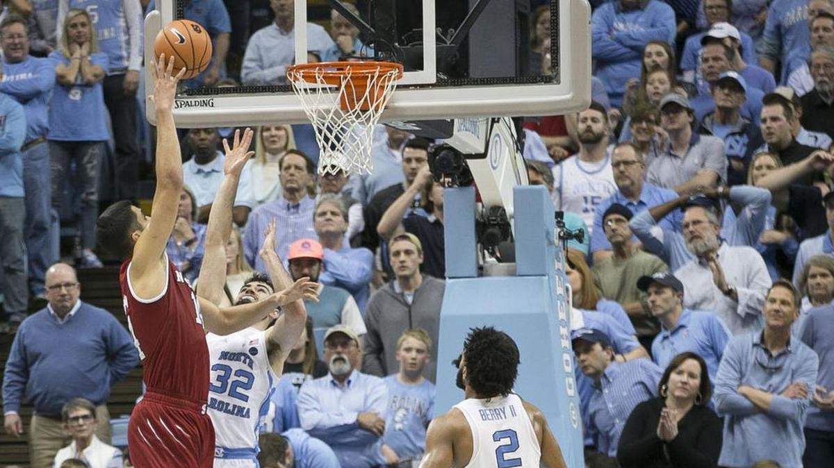North Carolina had trouble matching up with NC State’s Omer Yurtseven (14) late in regulation in Saturday’s loss.
