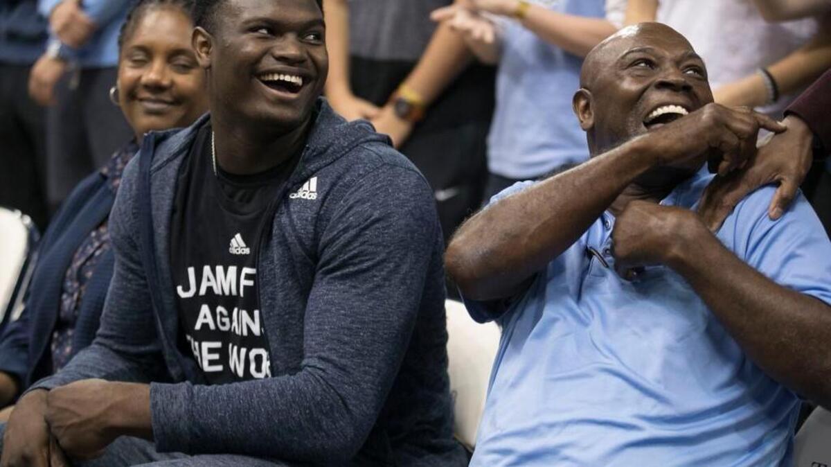 North Carolina prospect Zion Williamson, left, sits beside former Tar Heels great Phil Ford prior to the Tar Heels’ exhibition game against Barton College on Friday, October 27, 2017 at the Smith Center in Chapel Hill, N.C.