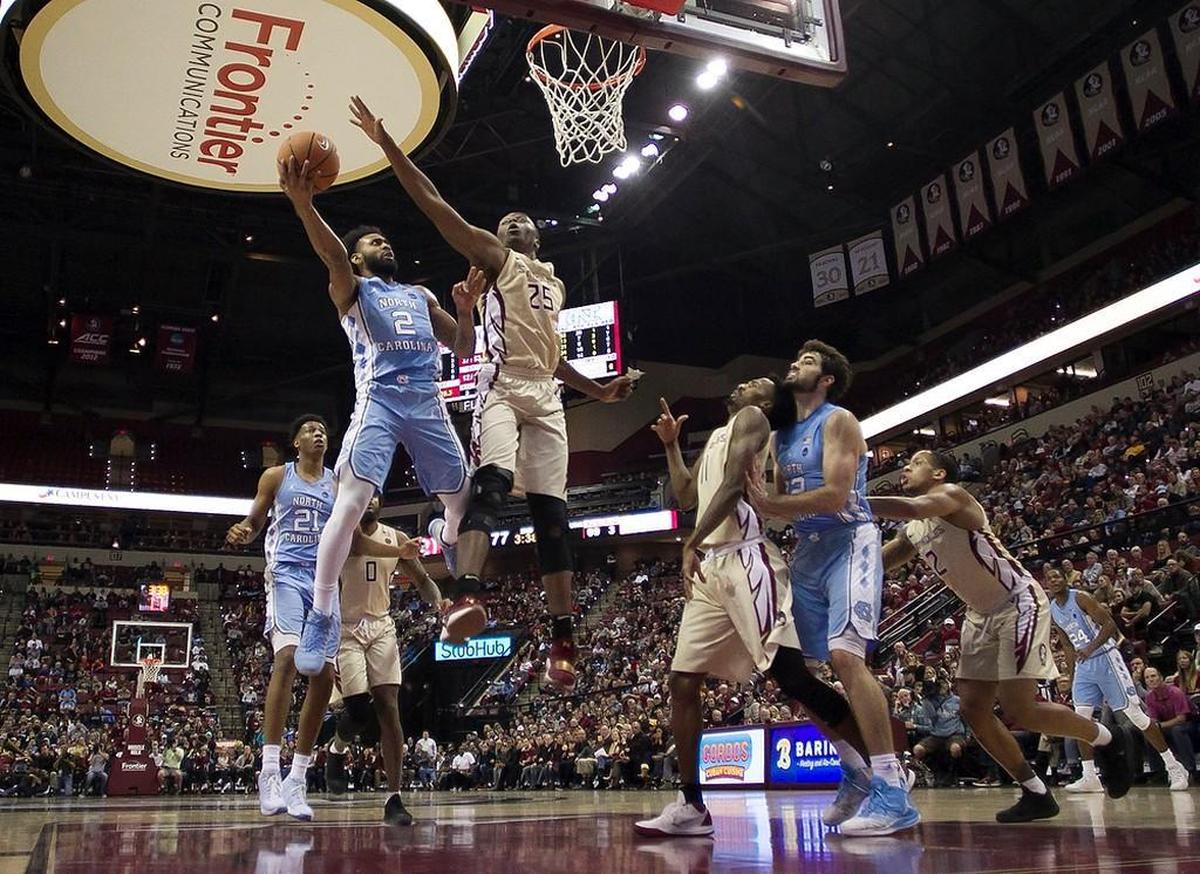 North Carolina’s Joel Berry II (2) drives to the basket against Florida State’s Mfiondu Kabegnele (25) in the second half on Wednesday, January 3, 2018 at the Tucker Civic Center in Tallahassee, Fla. Berry lead all scores with 28 point in the Tar Heels’81-80 loss.