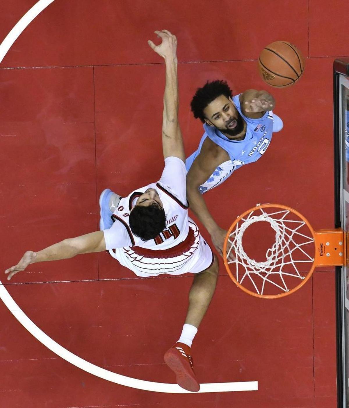 Senior guard Joel Berry (2) goes up for two of his game-high 23 points in UNC’s 93-76 win at Louisville on Saturday. (AP Photo/Timothy D. Easley)