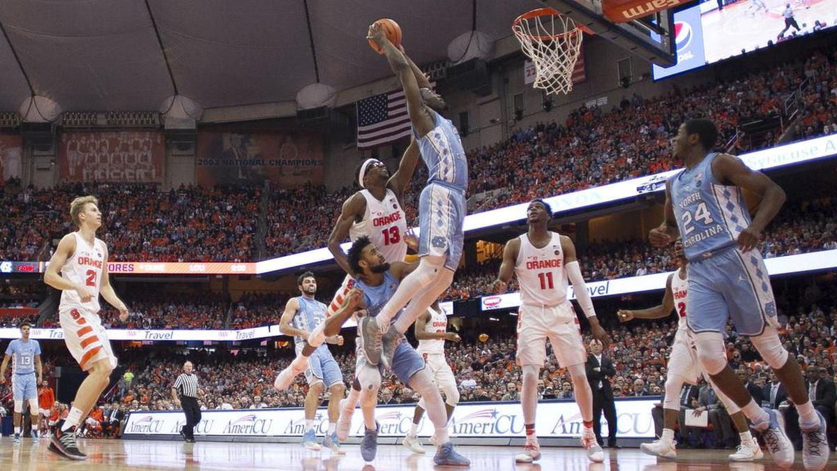 North Carolina’s Theo Pinson (1) goes up for two of his career-high 23 points in a 78-74 win at Syracuse.