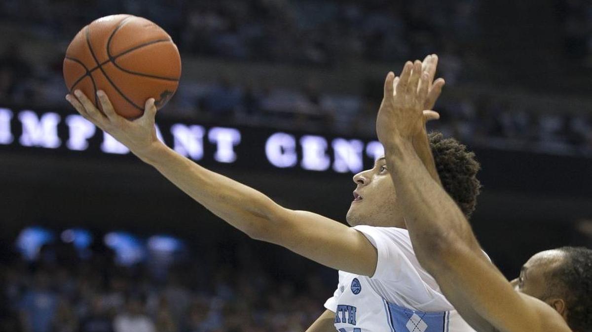 North Carolina’s Justin Jackson drives to the basket against Long Beach State.
