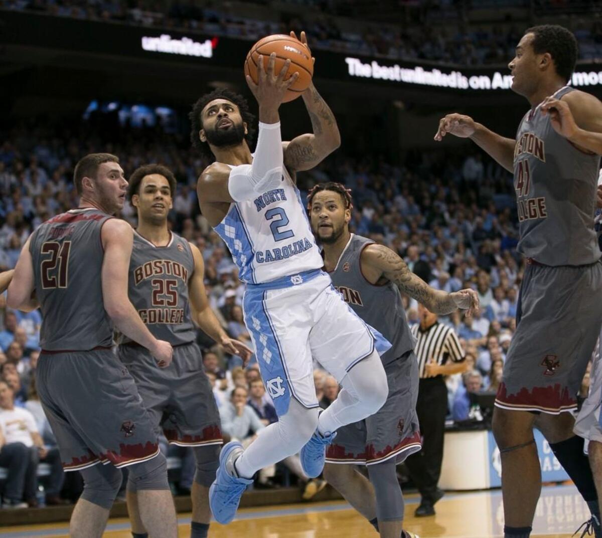 North Carolinas Joel Berry II (2) slices through the Boston College defense during the first half.