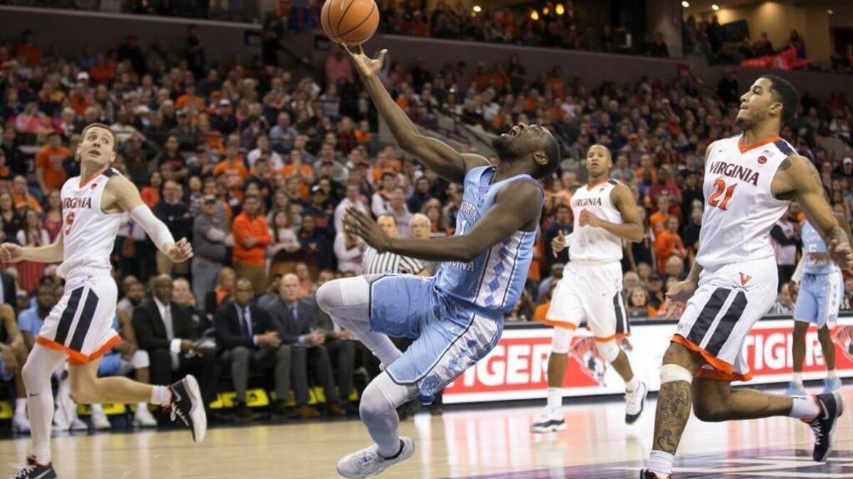 North Carolina’s Theo Pinson (1) loses his footing, and the ball late in the second half against Virginia on Saturday, Jan. 6, 2018 at John Paul Jones Arena in Charlottesville, Va. Pinson finished the game with four points in the Tar Heels 61-49 loss to Virginia.