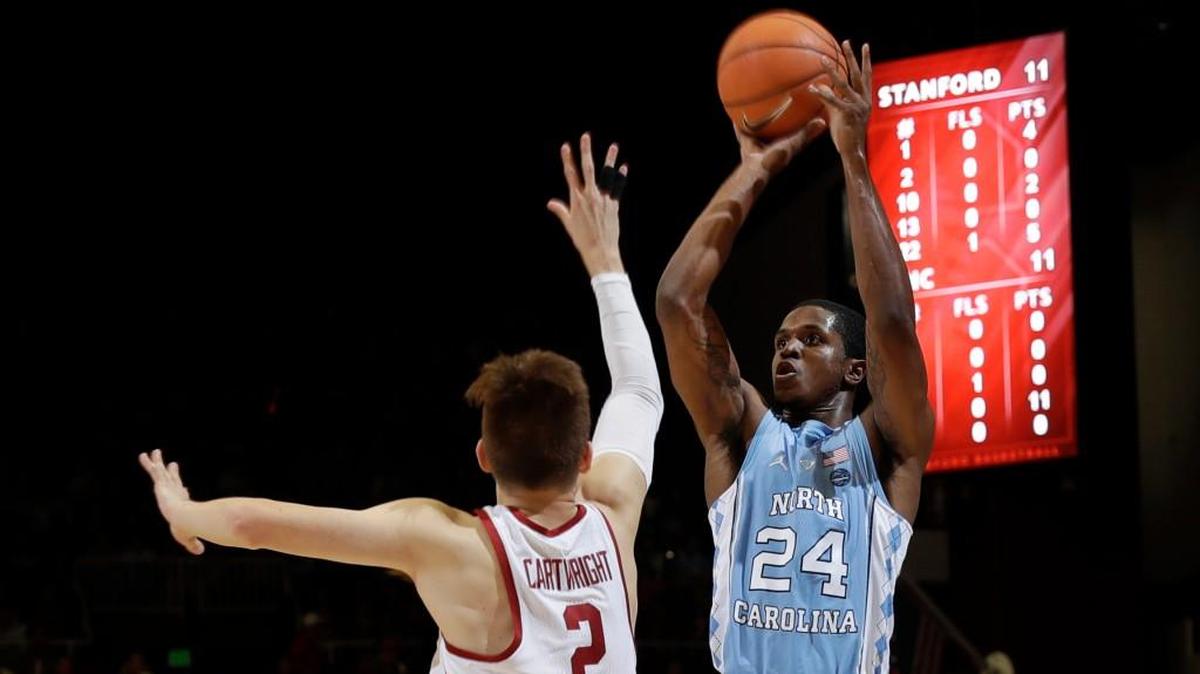 North Carolina guard Kenny Williams (24) shoots over Stanford guard Robert Cartwright (2) during the first half of an NCAA college basketball game Monday, Nov. 20, 2017, in Stanford, Calif. (AP Photo/Marcio Jose Sanchez)