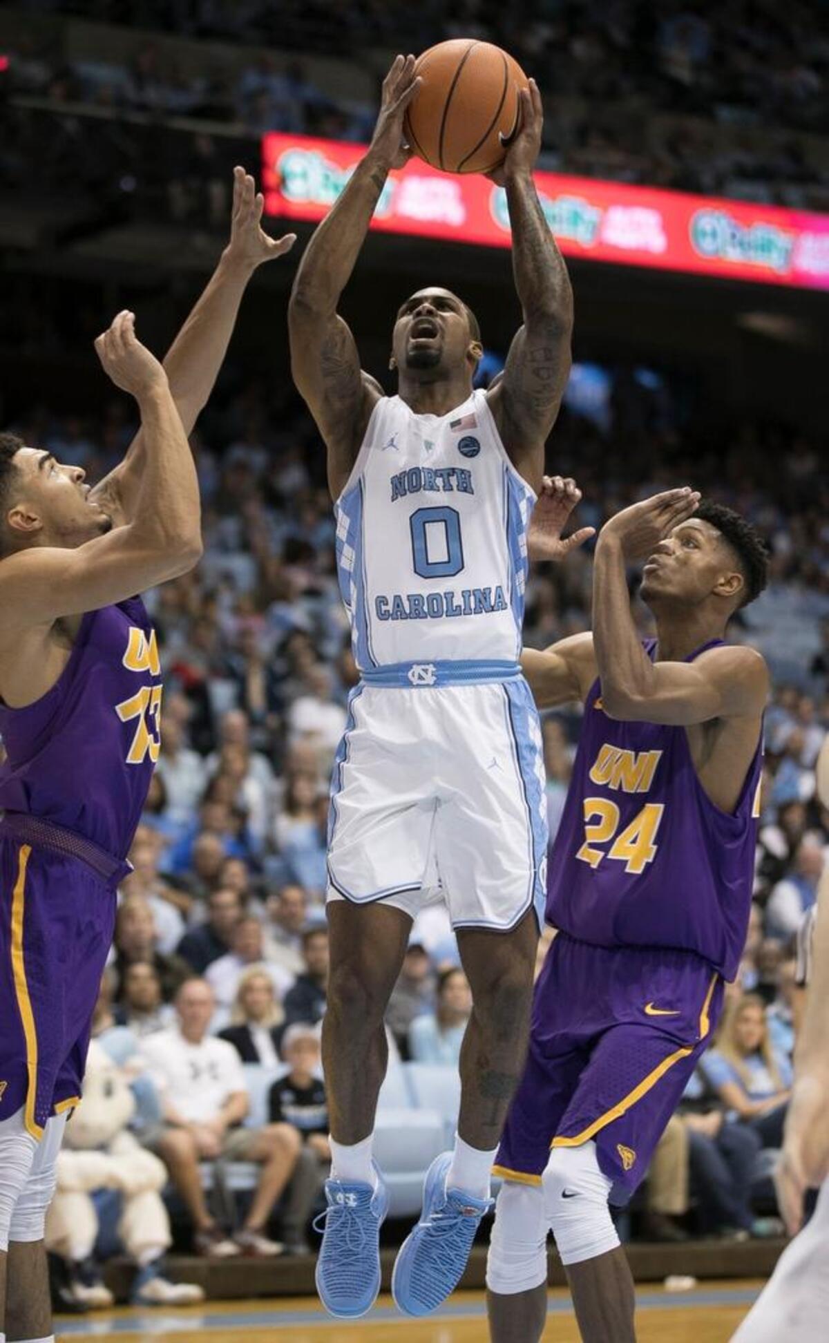 North Carolina’s Seventh Woods (0) puts up a shot between Northern Iowa’s Juwan McCloud (13) and Isaiah Brown (24) during the first half on November 10, 2017 at the Smith Center in Chapel Hill.