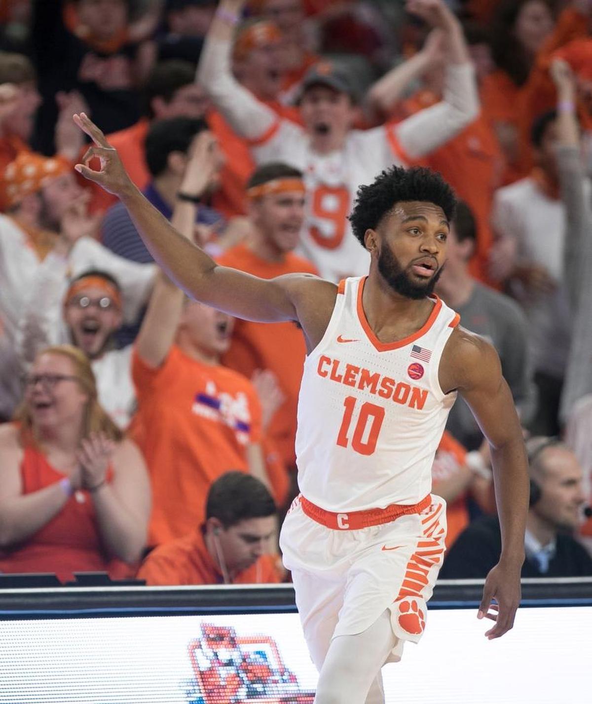 Clemson’s Gabe Devoe (10) celebrates after sinking a three-point basket during the first half against North Carolina on Tuesday, January 30, 2018 at Littlejohn Coliseum in Clemson, S.C.