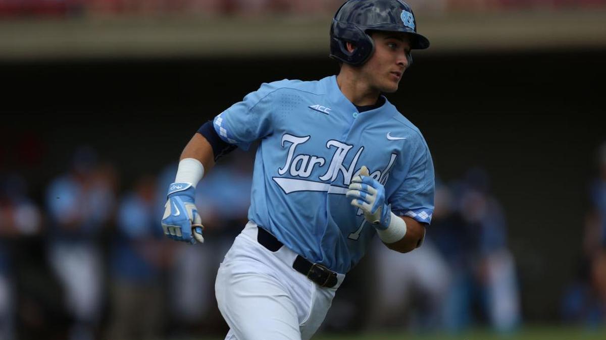 North Carolina short stop Logan Warmoth (7) runs for first base just before being tagged out during the Wolfpack’s 10-1 win over North Carolina on Saturday, May 21, 2016 at Doak Field in Raleigh.