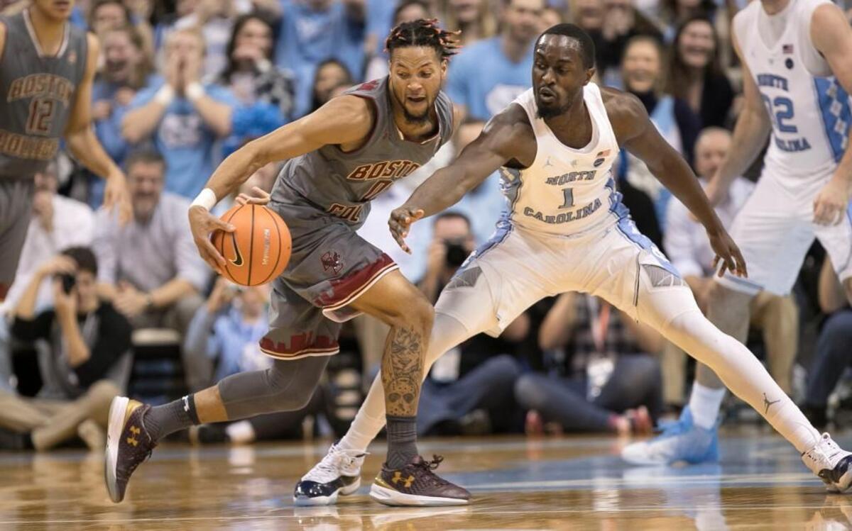 North Carolina’s Theo Pinson (1) defends Boston College’s Ky Bowman (0) during the first half against Boston College on Tuesday, January 9, 2018 at the Smith Center in Chapel Hill, N.C.