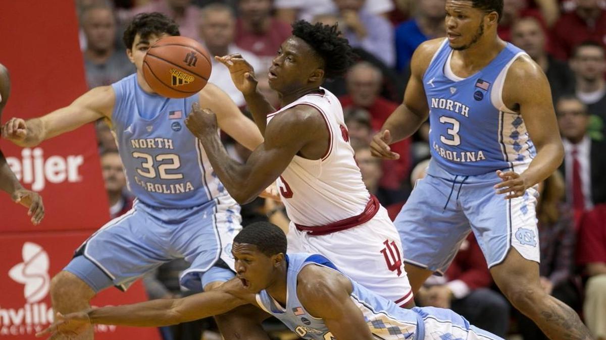 North Carolina’s Kenny Williams (24) tries for a steal from Indiana’s OG Anunoby (3) in the second half of their game Wednesday, November 30, 2016 at Assembly Hall in Bloomington, Indiana.