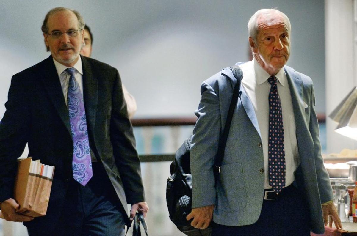 North Carolina basketball coach Roy Williams and his lawyer Jim Cooney, left, arrive at an NCAA hearing Wednesday, Aug. 16, 2017, in Nashville.