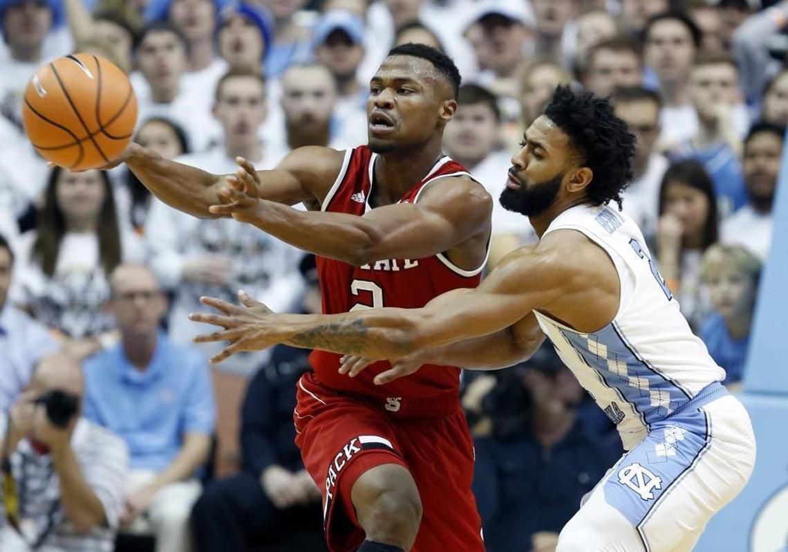 North Carolina's Joel Berry II (2), right, defends N.C. State's Torin Dorn (2) during the first half of N.C. State's game against UNC at the Dean E. Smith Center in Chapel Hill on Jan. 27, 2018.