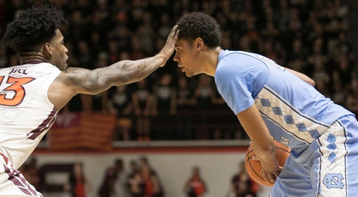 Virginia Tech’s Ahmed Hill (13) defends Cameron Johnson’s (13) during the first half on Monday, January 22, 2018 at Cassell Coliseum in Blacksburg, Virginia.