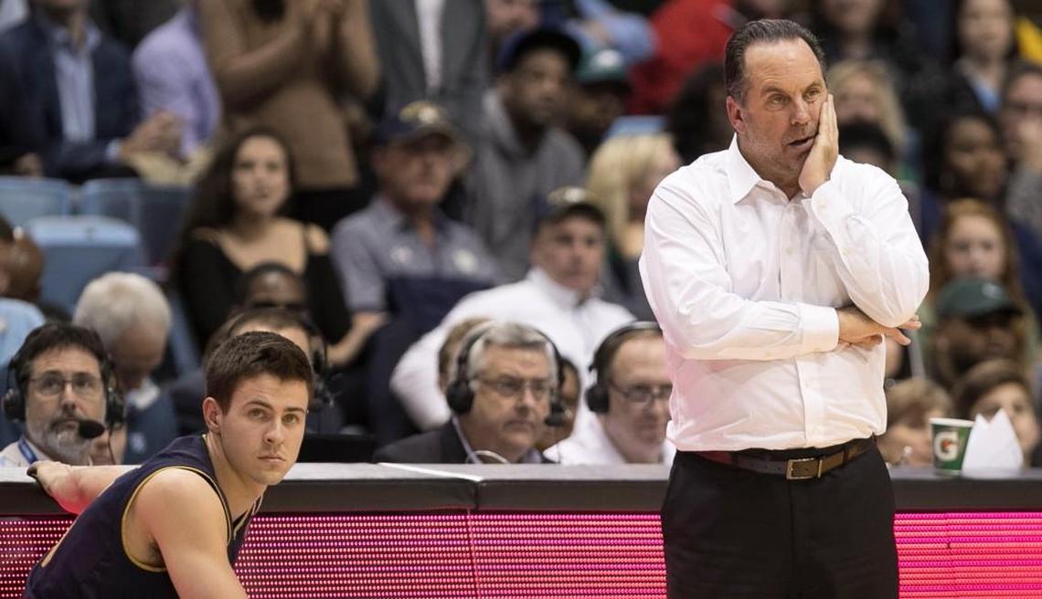 Notre Dame coach Mike Brey watches as North Carolina spreads their offense and runs down the clock in the closing minutes of their game on Monday, February 12, 2018 at the Smith Center in Chapel Hill, N.C.