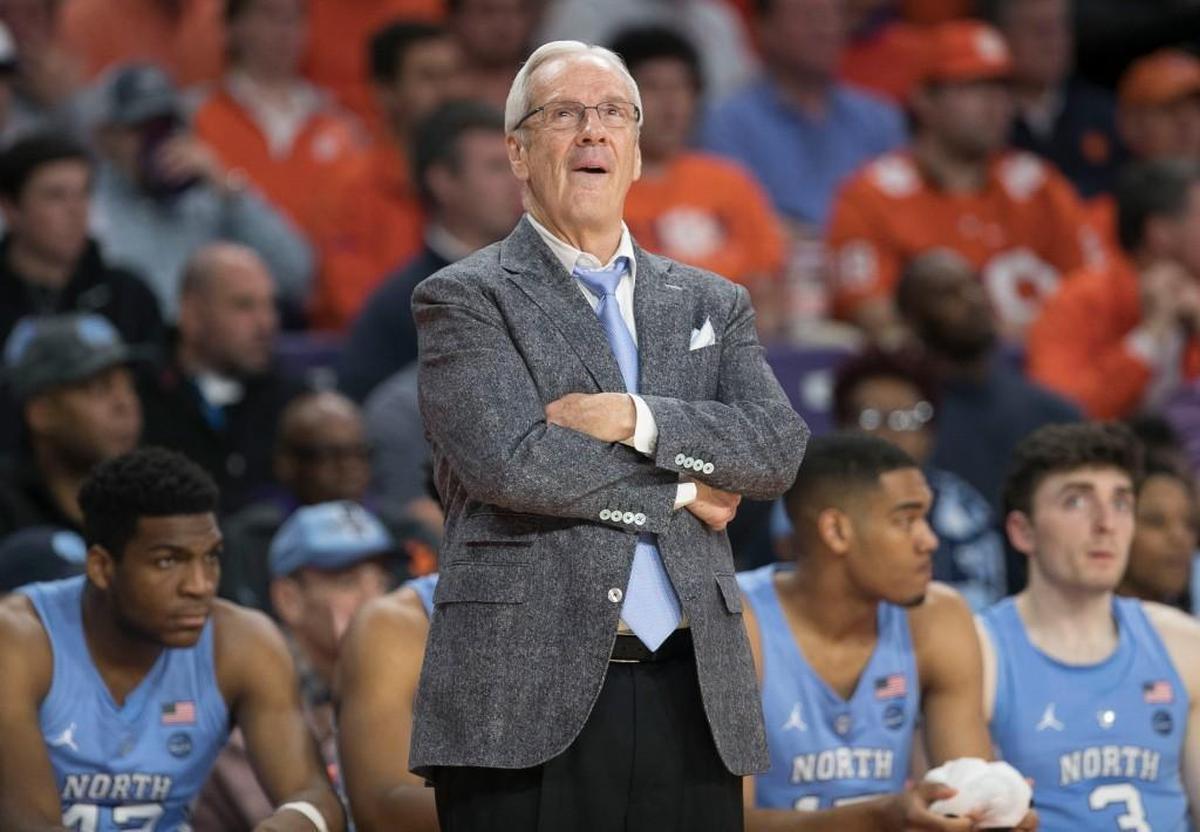 North Carolina coach Roy Williams checks the scoreboard as North Carolina cuts into the Clemson lead in the second half on Tuesday, January 30, 2018 at Littlejohn Coliseum inn Clemson, S.C.