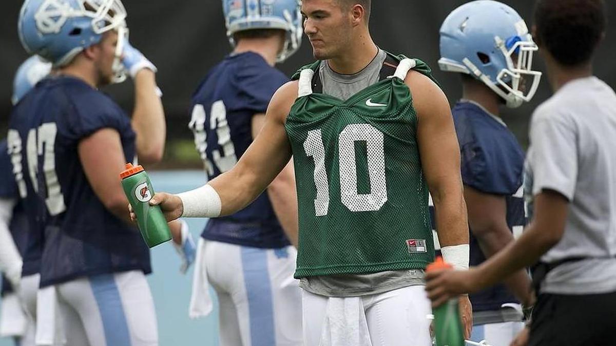 Mitch Trubisky, green jersey, is the Tar Heels’ clear starter, but weeks into preseason practice there’s no clear answer about who his backup is.