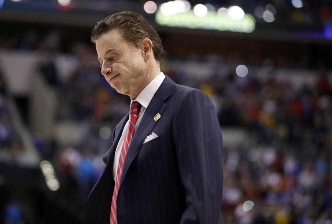 Louisville head coach Rick Pitino walks off the court after a 73-69 loss to Michigan in a second-round game in the men's NCAA college basketball tournament on March 19, 2017, in Indianapolis. (AP Photo/Jeff Roberson)