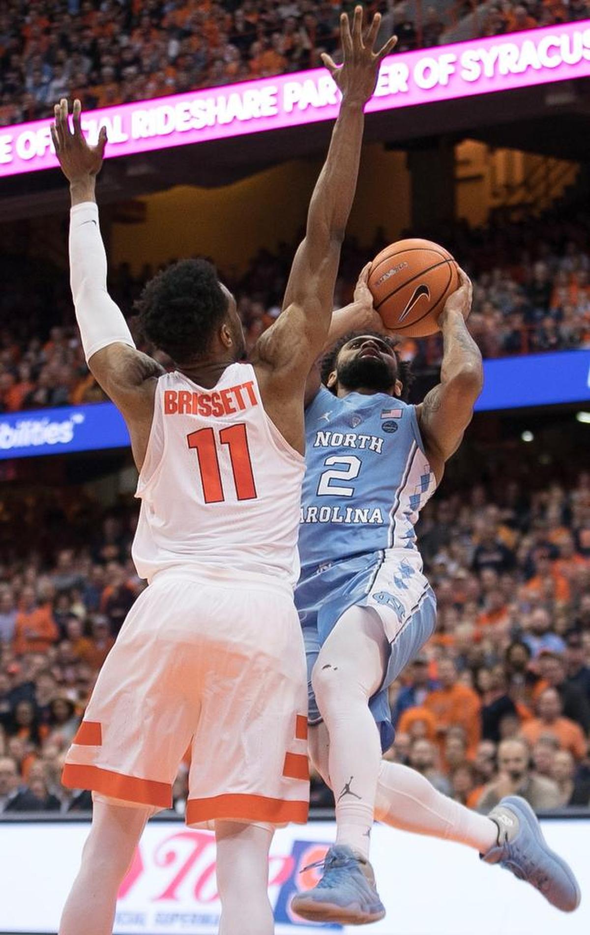North Carolina’s Joel Berry II (2) drives to the basket against Syracuse’s Oshae Brissett (11) during the second half on Wednesday, February 21, 2018 at the Carrier Dome in Syracuse, NY.