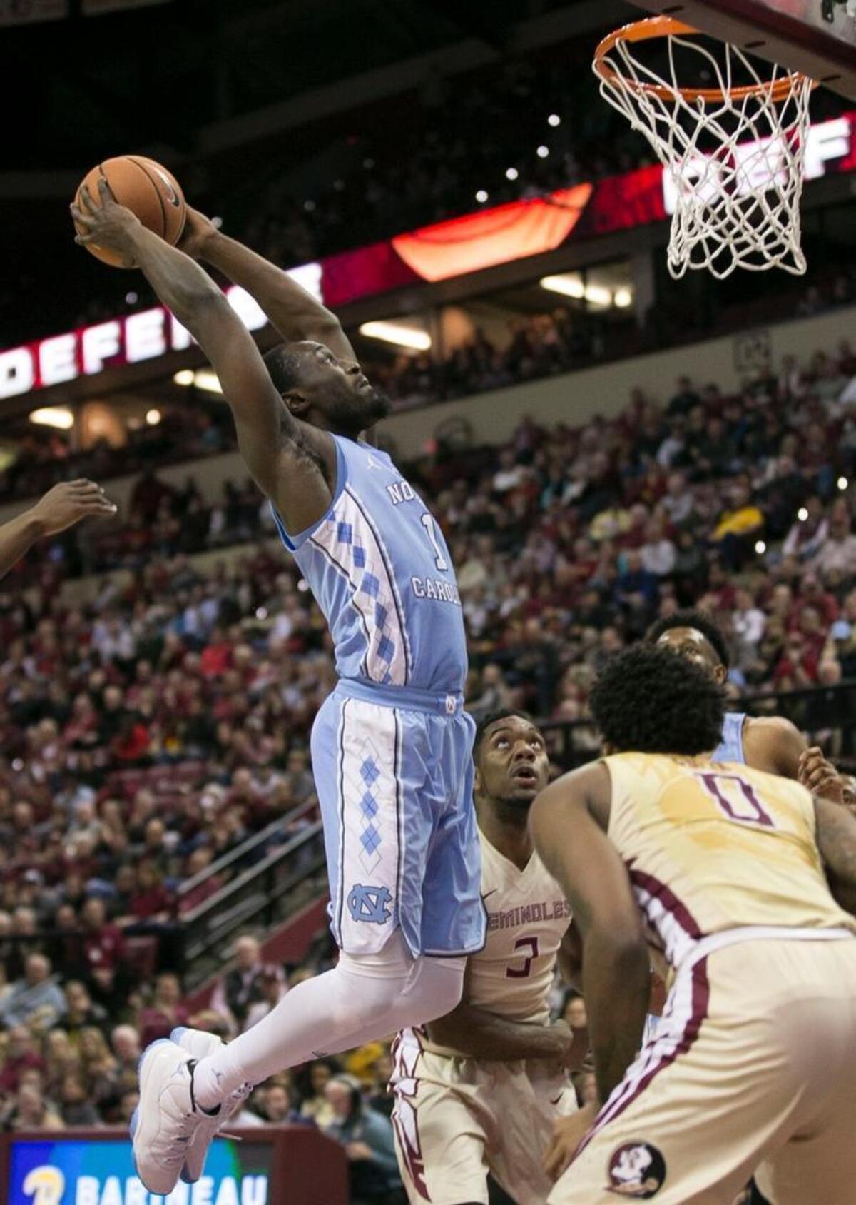 North Carolina’s Theo Pinson (1) glides to the basket for dunk in the second half against Florida State on Wednesday, January 3, 2018 at the Tucker Civic Center in Tallahassee, Fla.
