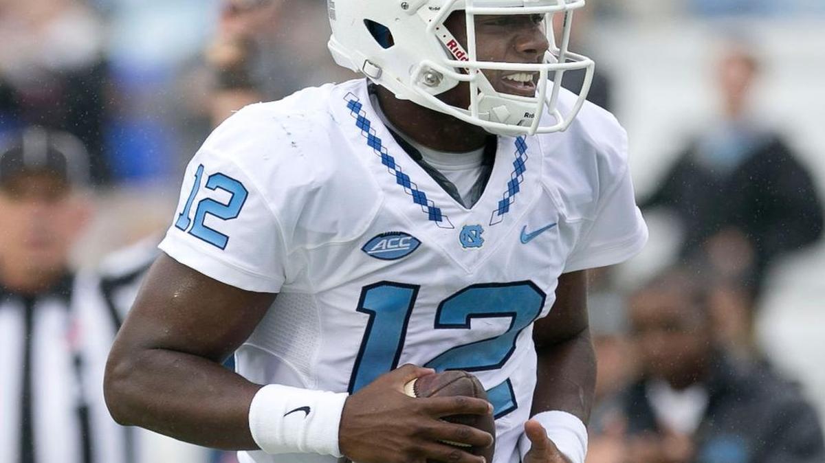 
North Carolina quarterback Marquise Williams (12) scores a touchdown on an 18-yard run during their game against Delaware on Saturday, September 26, 2015 at Kenan Stadium in Chapel Hill.
