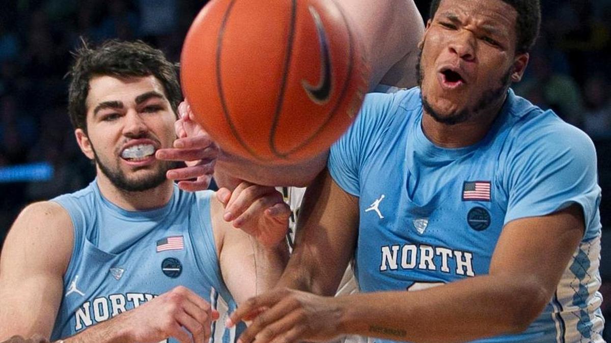 North Carolina’s Kennedy Meeks (3) and Luke Maye (32) battle for an offensive rebound with Georgia Tech’s Ben Lammers (44) during the second half on Saturday, December 31, 2016 at McCamish Pavillion in Atlanta, Georgia.