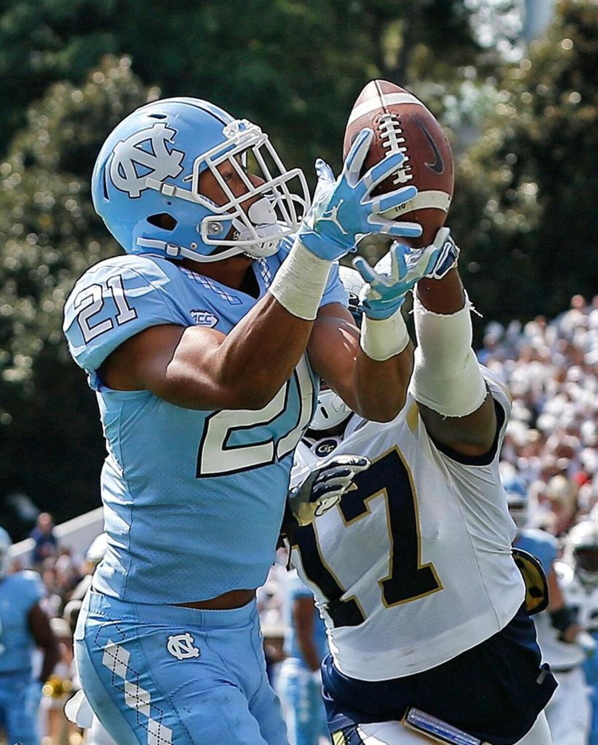 Georgia Tech defensive back Lance Austin (17) breaks up a pass intended for North Carolina wide receiver Devin Perry (21).