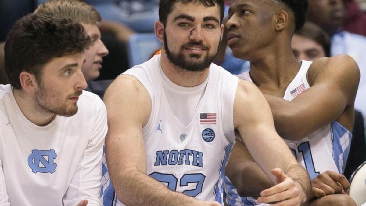 North Carolina’s Luke Maye (32) returns to the Tar Heels’ bench in the second half after receiving five stitches to his nose after taking a hit during the first half against Clemson on Tuesday, January 16, 2018 at the Smith Center in Chapel Hill, N.C.