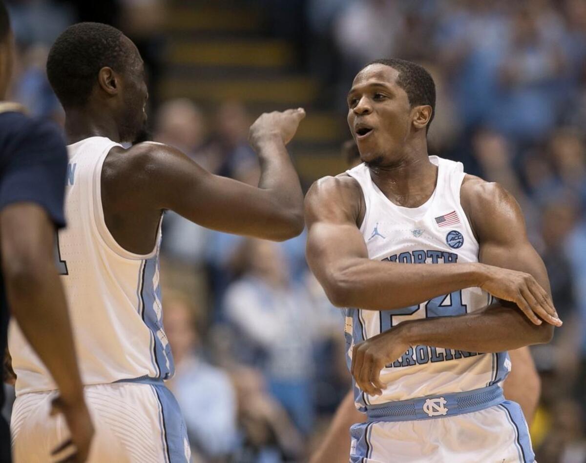 North Carolina’s Kenny Williams (24) reacts after the Tar Heels opened a 20 point lead over Michigan during the second half on Wednesday, November 29, 2017 at the Smith Center in Chapel Hill, N.C.