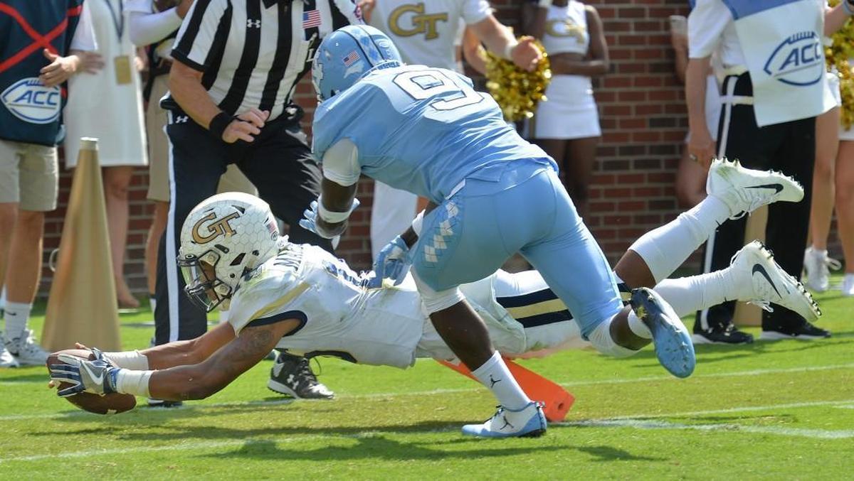 Georgia Tech quarterback TaQuon Marshall (16) dives into the end zone for a touchdown in the first half.