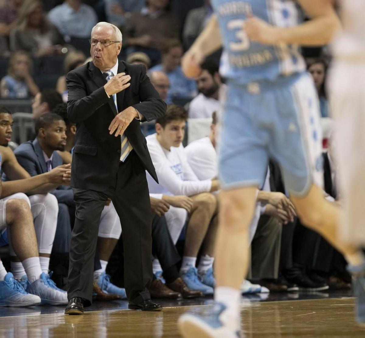 North Carolina coach Roy Williams signals for a walking call against Davidson during the first half on Friday, December 1, 2017 at the Spectrum Center in Charlotte, N.C.