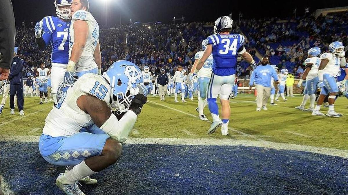 UNC junior safety Donnie Miles reacts after the Tar Heels’ loss at Duke last Thursday. Miles and his defensive teammates have yet to intercept a pass this season.