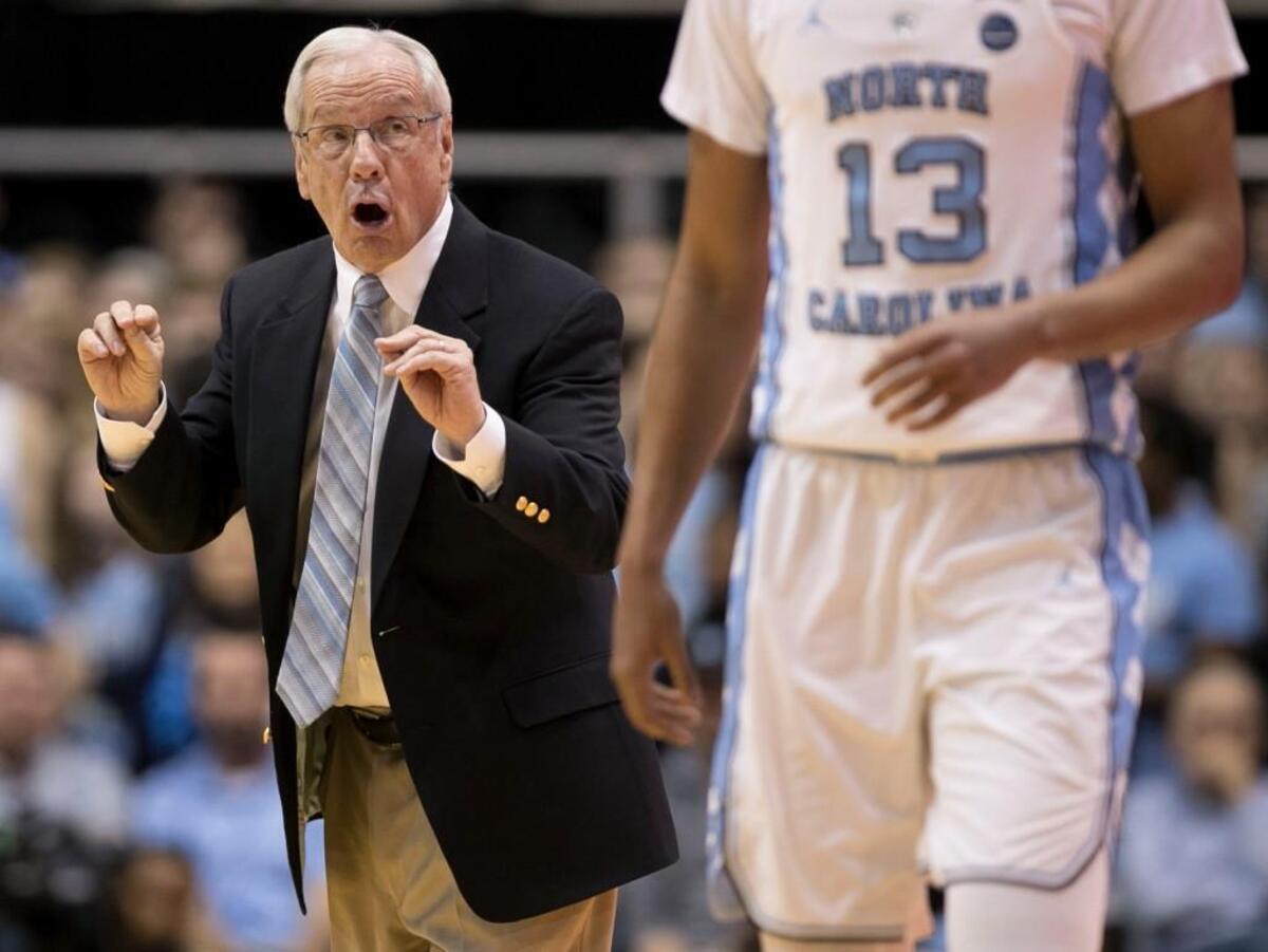 North Carolina coach Roy Williams instructs Cameron Johnson (13) during the first half against Boston College on Tuesday, January 9, 2018 at the Smith Center in Chapel Hill, N.C.