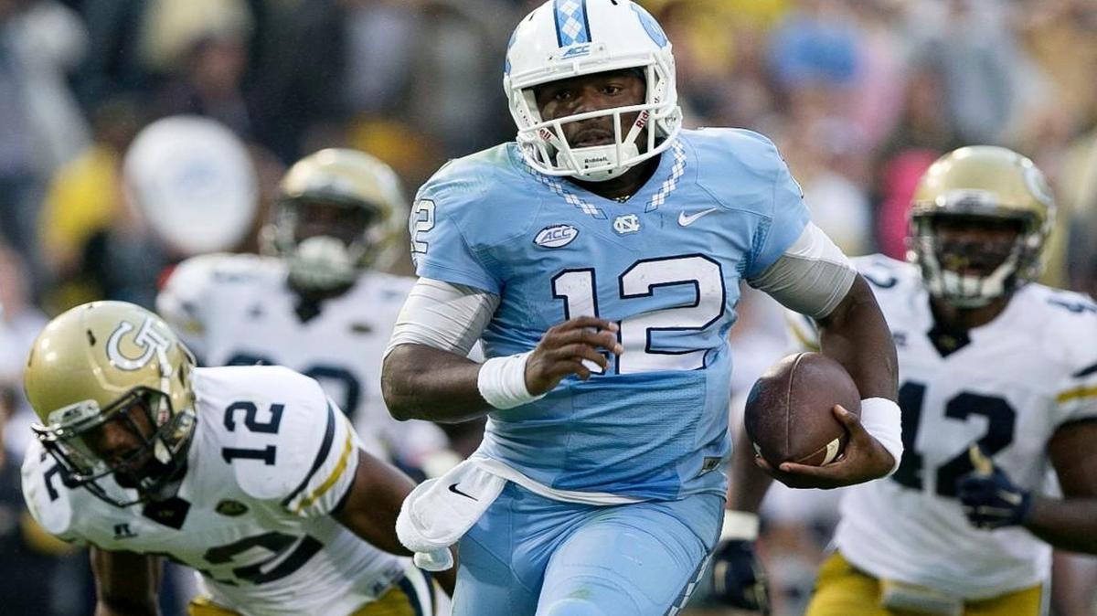 
North Carolina quarterback Marquise Williams rushes 27 yards for a touchdown in the fourth quarter to give the Tar Heels a 38-28 lead against Georgia Tech. 
